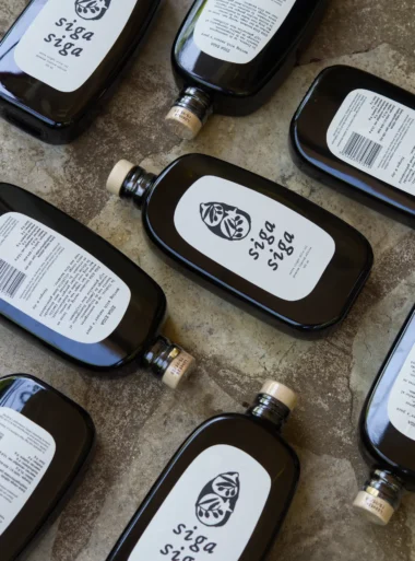2 infinity bottles Siga Siga extra virgin olive oil bottles from Messinia Greece