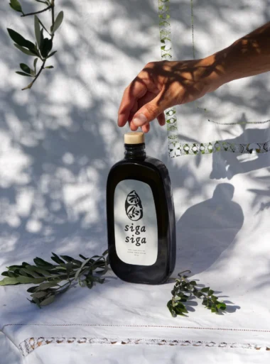 3 olive shoot Greek extra virgin olive oil bottle by Siga Siga Collective