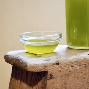 Olive Oil colour1 Greek extra virgin olive oil tasting in a small bowl